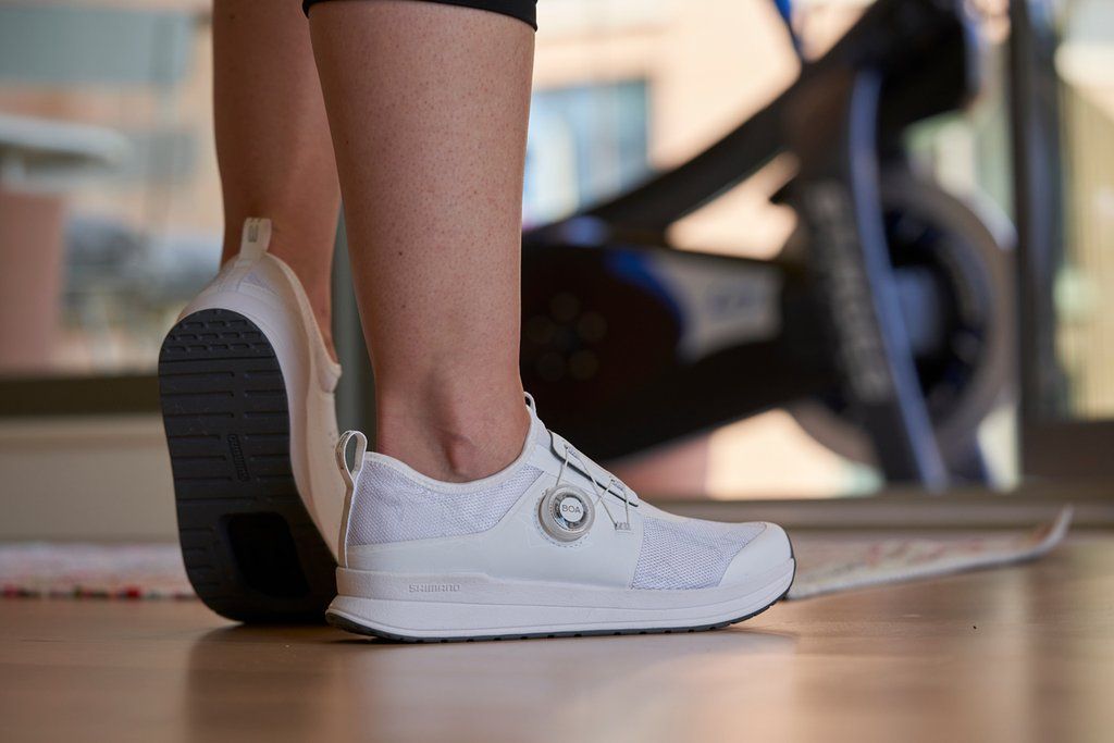 Women wearing a pair of White Shimano Indoor Cycling IC300 Shoes